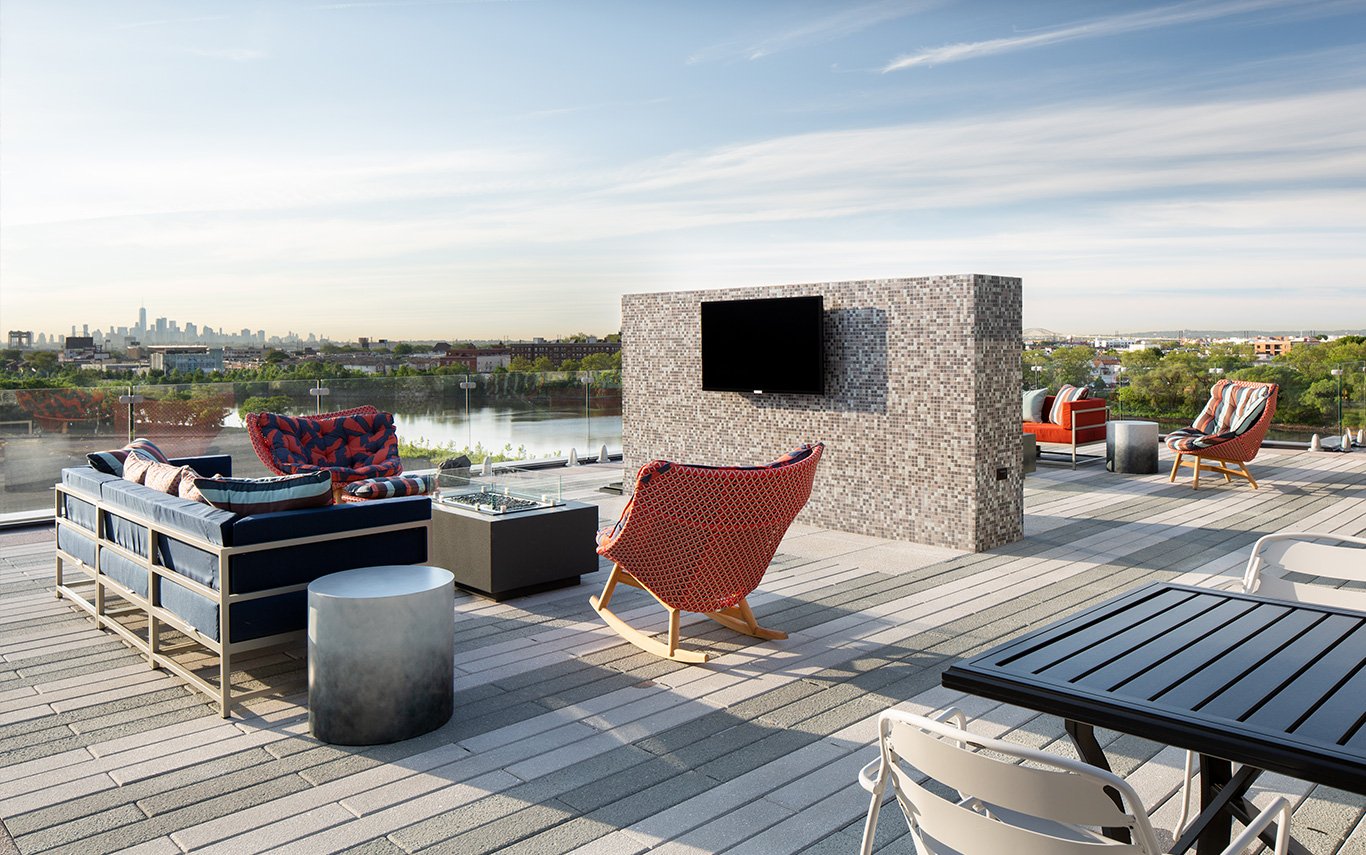 Cobalt Lofts rooftop deck overlooking the Harrison and Manhattan skylines